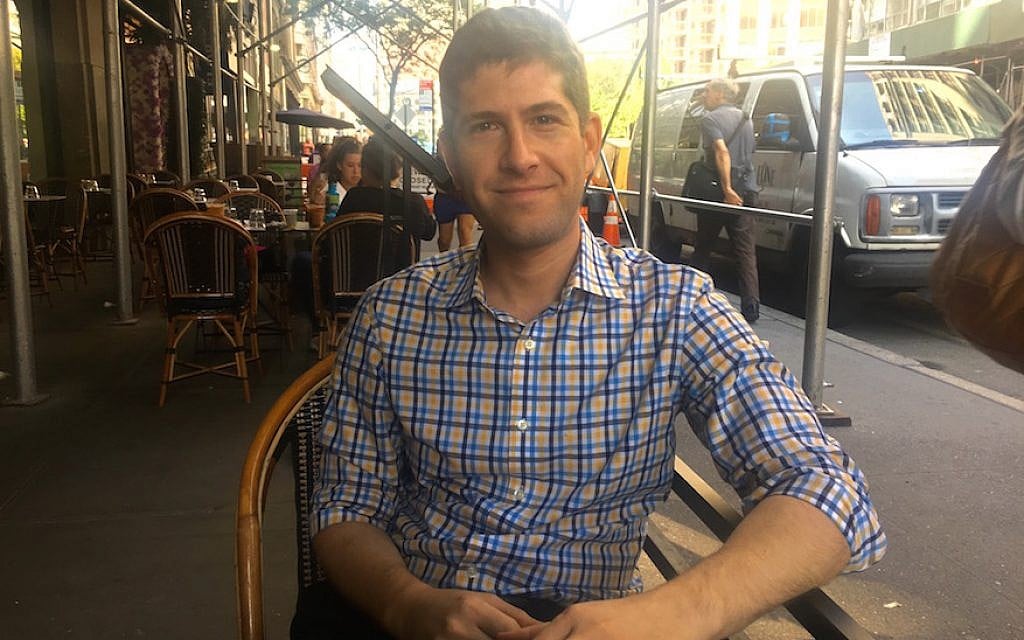 Mike Tolkin, the youngest candidate in the Democratic primary for New York mayor, at a city cafe, Sept. 5, 2017. (Josefin Dolsten/JTA) Mike Tolkin, the youngest candidate in the Democratic primary for New York mayor, at a city cafe, Sept. 5, 2017. (Josefin Dolsten/JTA)