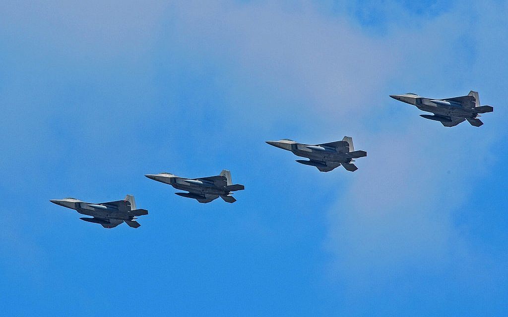 Four US Air Force F-22 Raptor fighter aircraft from Kadena Air Base, Japan, conduct a flyover in the vicinity of Osan Air Base, South Korea, in response to provocative action by North Korea February 17, 2016. (US Air Force/Song, Kyong Hwan)