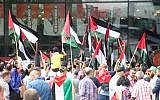 Hundreds demonstrate in a protest outside the Rotterdam Centraal Train Station on July 22, 2017, against the latest Israeli restrictions on Palestinians entry to Al-Aqsa mosque (Abdullah Asiran/Anadolu Agency/Getty Images via JTA)