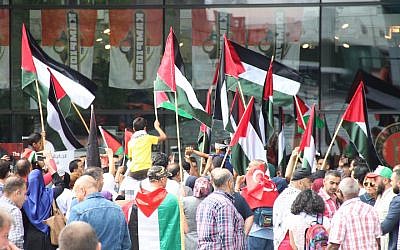 Hundreds demonstrate in a protest outside the Rotterdam Centraal Train Station on July 22, 2017, against the latest Israeli restrictions on Palestinians entry to Al-Aqsa mosque (Abdullah Asiran/Anadolu Agency/Getty Images via JTA)