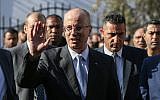 File: Palestinian Authority Prime Minister Rami Hamdallah arrives at a cabinet meeting in Gaza City on October 3, 2017. (AFP Photo/Mohammed Abed)