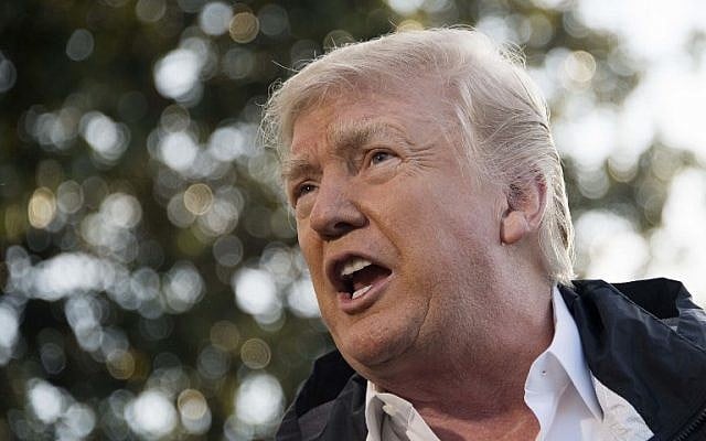 US President Donald Trump speaks with the press before boarding Marine One on the South Lawn of the White House in Washington, DC, en route to Puerto Rico, October 3, 2017. (AFP/JIM WATSON) US President Donald Trump speaks with the press before boarding Marine One on the South Lawn of the White House in Washington, DC, en route to Puerto Rico, October 3, 2017. (AFP/JIM WATSON)