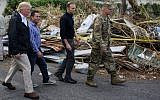 US President Donald Trump visits residents affected by Hurricane in Guaynabo, west of San Juan, Puerto Rico on October 3, 2017.
(AFP PHOTO / MANDEL NGAN)