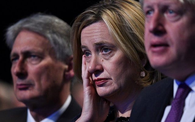 Britain's Chancellor of the Exchequer Philip Hammond, Home Secretary Amber Rudd and Foreign Secretary Boris Johnson listen to the speech by Britain's Prime Minister Theresa May on the final day of the Conservative Party annual conference at the Manchester Central Convention Centre in Manchester, northwest England, on October 4, 2017. (AFP PHOTO / Oli SCARFF) Britain's Chancellor of the Exchequer Philip Hammond, Home Secretary Amber Rudd and Foreign Secretary Boris Johnson listen to the speech by Britain's Prime Minister Theresa May on the final day of the Conservative Party annual conference at the Manchester Central Convention Centre in Manchester, northwest England, on October 4, 2017. (AFP PHOTO / Oli SCARFF)