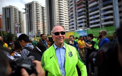 This file photo taken on July 31, 2016, shows Carlos Arthur Nuzman, president of the Rio 2016 Organizing Committee, attending the welcome ceremony for Brazil's Olympic team at the Olympic Village in Rio de Janeiro. (AFP Photo/Johannes Eisele)