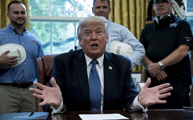 US President Donald Trump speaks during a proclamation signing in the Oval Office of the White House on October 6, 2017.(AFP Photo/Brendan Smialowski) US President Donald Trump speaks during a proclamation signing in the Oval Office of the White House on October 6, 2017.(AFP Photo/Brendan Smialowski)