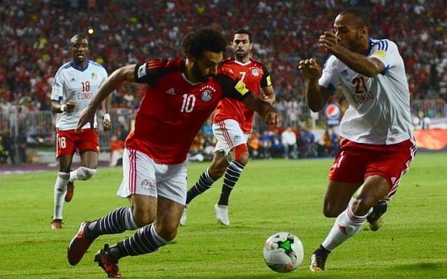 Egypt's Mohamed Salah vies for the ball against Congo's Tobias Badila during their World Cup 2018 Africa qualifying match between Egypt and Congo at the Borg el-Arab stadium in Alexandria on October 8, 2017. (AFP Photo/Tarek Abdel Hamid) Egypt's Mohamed Salah vies for the ball against Congo's Tobias Badila during their World Cup 2018 Africa qualifying match between Egypt and Congo at the Borg el-Arab stadium in Alexandria on October 8, 2017. (AFP Photo/Tarek Abdel Hamid)