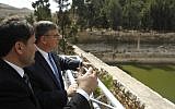 Donald Blome (L), US Consul General in Jerusalem, is seen during the launch of a conservation project to preserve the Solomon's Pools as he visits the site in the West Bank town of Bethlehem, on October 10, 2017. (AFP PHOTO/Musa AL SHAER)
