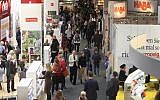 Visitors are pictured at the Frankfurt Book Fair 2017 in Frankfurt am Main, Germany, on October 11, 2017. (AFP/Amelie QUERFURTH)