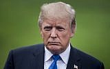 US President Donald Trump pauses while speaking to the press on the South Lawn of the White House October 13, 2017 in Washington, DC. (AFP PHOTO / Brendan Smialowski)