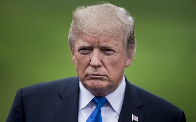 US President Donald Trump pauses while speaking to the press on the South Lawn of the White House October 13, 2017 in Washington, DC. (AFP PHOTO / Brendan Smialowski) US President Donald Trump pauses while speaking to the press on the South Lawn of the White House October 13, 2017 in Washington, DC. (AFP PHOTO / Brendan Smialowski)