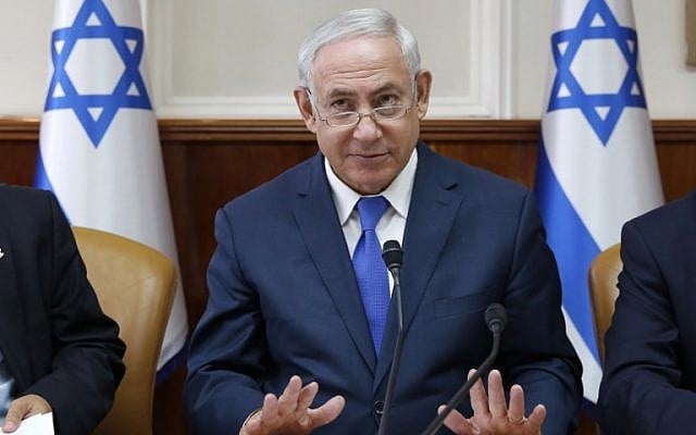 Prime Minister Benjamin Netanyahu attends the weekly cabinet meeting at the Prime Minister's Office in Jerusalem on October 15, 2017. (AFP Photo/Pool/Abir Sultan) Prime Minister Benjamin Netanyahu attends the weekly cabinet meeting at the Prime Minister's Office in Jerusalem on October 15, 2017. (AFP Photo/Pool/Abir Sultan)