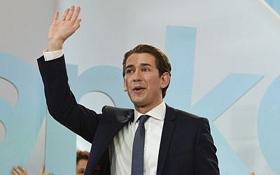 Austria's Foreign Minister and leader of Austria's center-right People's Party (OeVP) Sebastian Kurz waves to supporters during the party's election event following the general elections in Vienna, Austria, on October 15, 2017.  (AFP/ APA / ROBERT JAEGER)