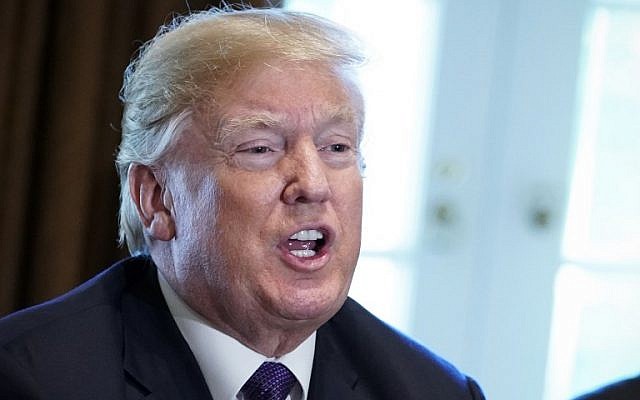US President Donald Trump speaks at a meeting with members of the the Senate Finance Committee and his economic team at the White House on October 18, 2017. (AFP Photo/Mandel Ngan) US President Donald Trump speaks at a meeting with members of the the Senate Finance Committee and his economic team at the White House on October 18, 2017. (AFP Photo/Mandel Ngan)