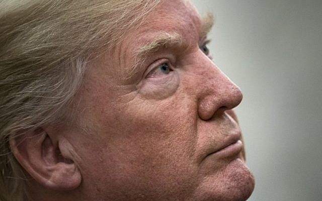US President Donald Trump waits for a meeting with the UN Secretary General in the Oval Office of the White House in Washington, DC, on October 20, 2017. (AFP PHOTO / Brendan Smialowski) US President Donald Trump waits for a meeting with the UN Secretary General in the Oval Office of the White House in Washington, DC, on October 20, 2017. (AFP PHOTO / Brendan Smialowski)