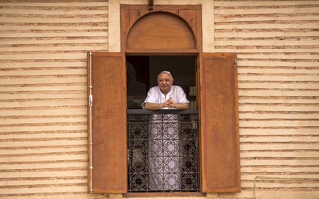 Illustrative: A Moroccan Jewish man looks out his window at the street below from his house in the 'Mellah' Jewish quarter of the Medina in Marrakesh, on October 13, 2017. (AFP PHOTO / FADEL SENNA) Illustrative: A Moroccan Jewish man looks out his window at the street below from his house in the 'Mellah' Jewish quarter of the Medina in Marrakesh, on October 13, 2017. (AFP PHOTO / FADEL SENNA)