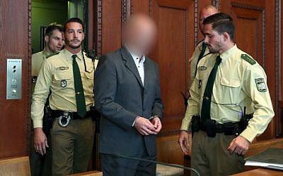 Wolfgang Plan arrives for a hearing in the district court in Nuremberg, Germany, on October 23, 2017. (AFP Photo/dpa/Daniel Karmann)