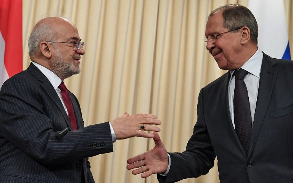 Russian Foreign Minister Sergei Lavrov, right, shakes hands with his Iraqi counterpart Ibrahim al-Jaafari at the end of a joint press conference following their meeting in Moscow on October 23, 2017 (Kirill Kudryavtsev/AFP photo)