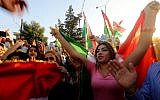 Syrian Kurds demonstrate in the northeastern Syrian city of Qamishli against Iraqi forces operation in the multi-ethnic city of Kirkuk and calling upon the international community to defend Kurdish regions in Iraq, October 23, 2017. (AFP/Delil souleiman)
