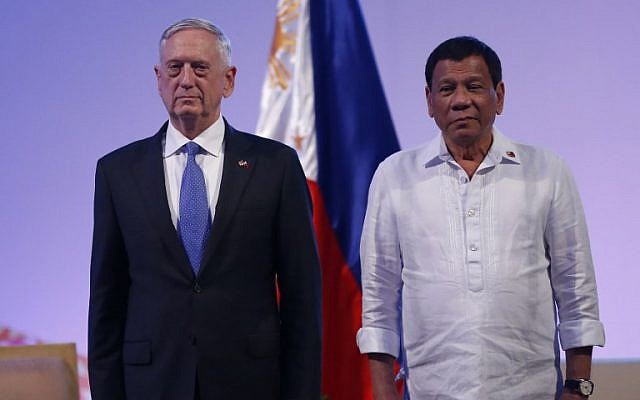 Philippine President Rodrigo Duterte (R) meets US Defense Secretary James Mattis (L) during a courtesy call at the 11th Association of Southeast Asian Nations (ASEAN) Defense Ministers' Meeting (ADMM) and 4th ADMM-Plus, in Clark, Pampanga, east of Manila on October 24, 2017.(AFP PHOTO / POOL / DONDI TAWATAO) Philippine President Rodrigo Duterte (R) meets US Defense Secretary James Mattis (L) during a courtesy call at the 11th Association of Southeast Asian Nations (ASEAN) Defense Ministers' Meeting (ADMM) and 4th ADMM-Plus, in Clark, Pampanga, east of Manila on October 24, 2017.(AFP PHOTO / POOL / DONDI TAWATAO)