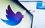 The logo of Twitter, the social networking website, on a computer screen in London, England, on September 11, 2013. (AFP Photo/Leon Neal/File)