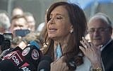 Argentina's former president and elected senator Cristina Fernandez de Kirchner speaks to reporters as she leaves the court in Buenos Aires on October 26, 2017. (AFP/Eitan Abramovich)