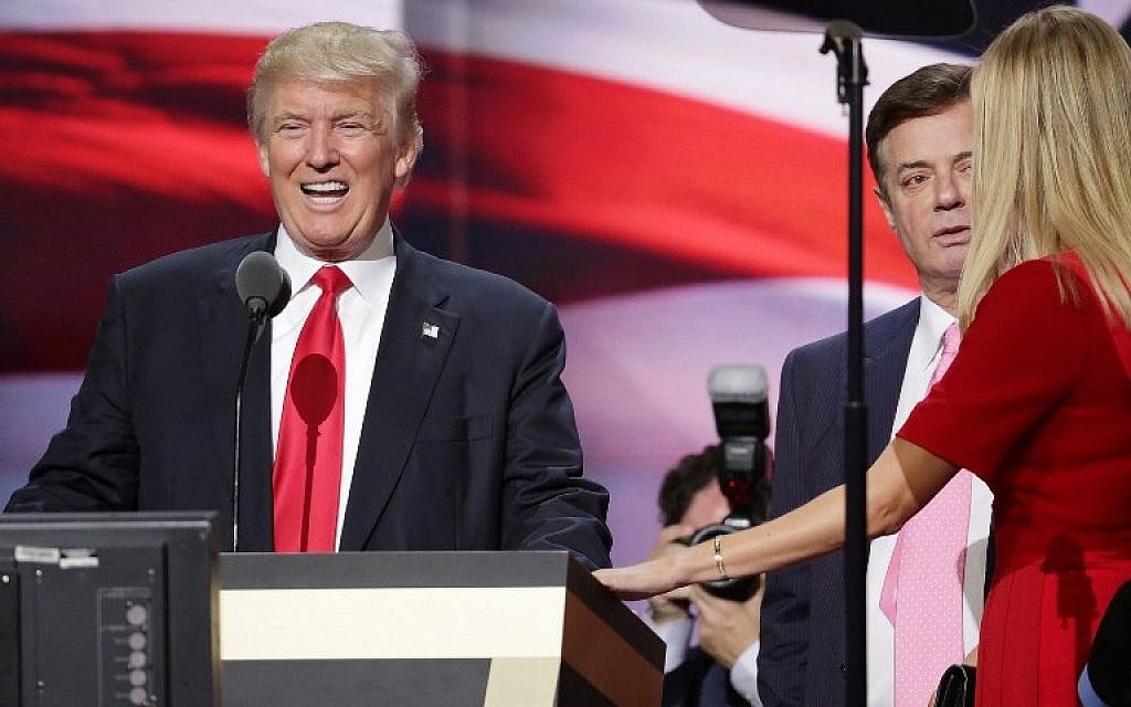 Then-Republican presidential candidate Donald Trump and his daughter Ivanka Trump, right, working with former campaign manager Paul Manafort, center, at the Republican National Convention in Cleveland, Ohio, on July 20, 2016. (Chip Somodevilla/AFP Photo)
