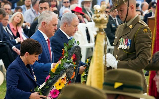 Australian Prime Minister Malcolm Turnbull (C), Israeli Prime Minister Benjamin Netanyahu (R), and New Zealand Governor General Patsy Reddy (L) lay wreaths at the memorial for the fallen in the Battle of Beersheba during a ceremony in the British Cemetery in Beersheba on October 31, 2017, to mark the 100th anniversary of the Battle of Beersheba. 
Hundreds of Australians arrived in Israel for a weeklong visit to participate in the one-hundred year anniversary marking the decisive victory of the British Army and ANZAC in the Battle of Beersheba, which resulted in the conquest of the city and the defeat of the Ottoman Empire. / AFP PHOTO / POOL / JIM HOLLANDER
