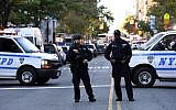 File: NYPD officers in New York on October 31, 2017. (AFP Photo/Don Emmert)