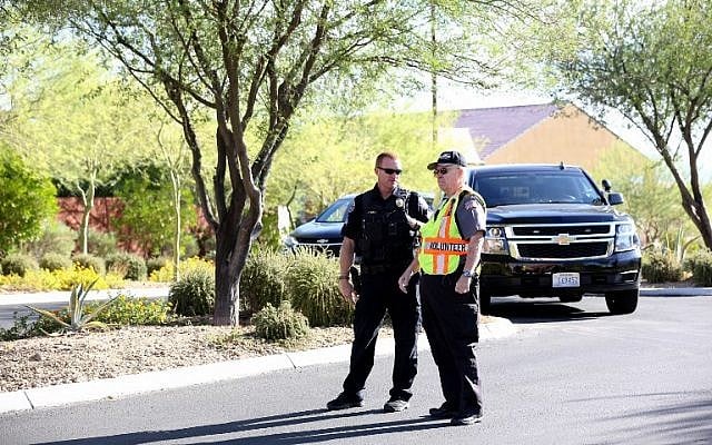 A Mesquite Police Department officer and volunteer block access to the Sun City Mesquite community where Las Vegas gunman Stephen Padock lived, on October 2, 2017, in Mesquite, Nevada. (Gabe Ginsberg/Getty Images/AFP) A Mesquite Police Department officer and volunteer block access to the Sun City Mesquite community where Las Vegas gunman Stephen Padock lived, on October 2, 2017, in Mesquite, Nevada. (Gabe Ginsberg/Getty Images/AFP)