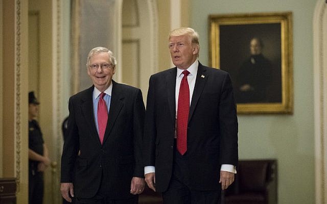 US President Donald Trump (R) and Senate Majority Leader Mitch McConnell (R-KY) walk to a lunch with Senate Republicans on Capitol Hill, October 24, 2017 in Washington, DC. ( Drew Angerer/Getty Images/AFP) US President Donald Trump (R) and Senate Majority Leader Mitch McConnell (R-KY) walk to a lunch with Senate Republicans on Capitol Hill, October 24, 2017 in Washington, DC. ( Drew Angerer/Getty Images/AFP)