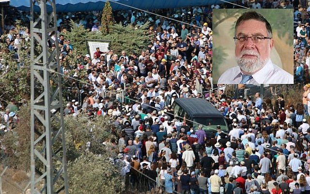 Mourners attend the funeral of Reuben Schmerling (inset) in the West Bank settlement of Elkana on October 6, 2017. (Dani Sitron) Mourners attend the funeral of Reuben Schmerling (inset) in the West Bank settlement of Elkana on October 6, 2017. (Dani Sitron)