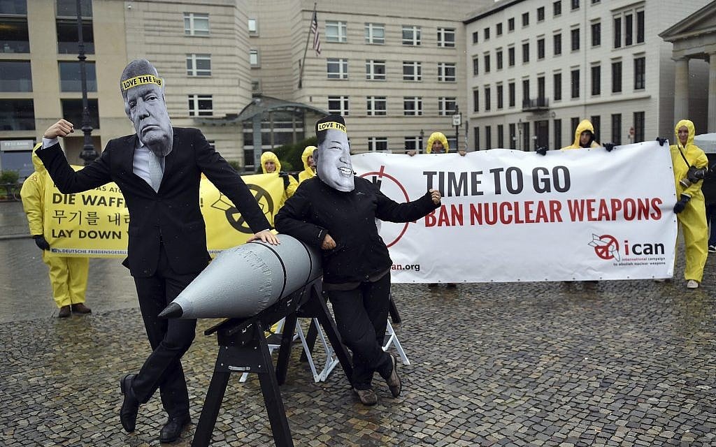 In this file photo from September 13, 2017, activists from the International Campaign to Abolish Nuclear Weapons (ICAN) protest against the conflict between North Korea and the USA with masks of North Korean ruler Kim Jong Un, right, and US president Donald Trump, left, in front of the US embassy in Berlin, Germany. (Britta Pedersen/dpa via AP) In this file photo from September 13, 2017, activists from the International Campaign to Abolish Nuclear Weapons (ICAN) protest against the conflict between North Korea and the USA with masks of North Korean ruler Kim Jong Un, right, and US president Donald Trump, left, in front of the US embassy in Berlin, Germany. (Britta Pedersen/dpa via AP)