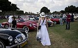 People look at antique cars during the 31st annual 'Five Club' car collectors' meeting in Ramat Gan, Israel, Friday, Oct. 6, 2017. (AP/Oded Balilty)