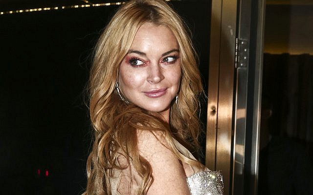 In this Oct. 16, 2016, file photo, actress Lindsay Lohan appears at the opening night of the Lohan Nightclub in Athens, Greece. (AP Photo/Yorgos Karahalis, File)