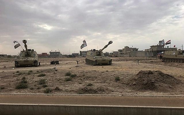Illustrative: Iraqi tanks deploy in the village of Bashir, south of Kirkuk, Iraq, Friday, Oct. 13, 2017. Kurdish forces have withdrawn from the edges of a disputed region in northern Iraq, a commander said Friday, amid tensions with Iraq's central government over the administration of the oil-rich city of Kirkuk. (AP Photo/Emad Matti) Illustrative: Iraqi tanks deploy in the village of Bashir, south of Kirkuk, Iraq, Friday, Oct. 13, 2017. Kurdish forces have withdrawn from the edges of a disputed region in northern Iraq, a commander said Friday, amid tensions with Iraq's central government over the administration of the oil-rich city of Kirkuk. (AP Photo/Emad Matti)