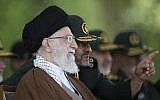 In this Wednesday, May 20, 2015 file picture released by the official website of the office of the Iranian supreme leader, Ayatollah Ali Khamenei listens to IRGC commander Mohammad Ali Jafari during a graduation ceremony of officers in Tehran, Iran. (Office of the Iranian Supreme Leader via AP, File)