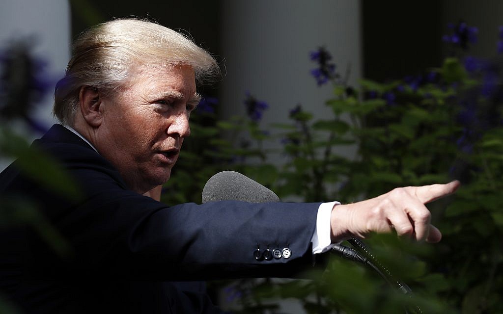 US President Donald Trump points to a reporter to ask a question during a media availability in the Rose Garden, October 16, 2017, in Washington. (AP Photo/Alex Brandon) US President Donald Trump points to a reporter to ask a question during a media availability in the Rose Garden, October 16, 2017, in Washington. (AP Photo/Alex Brandon)