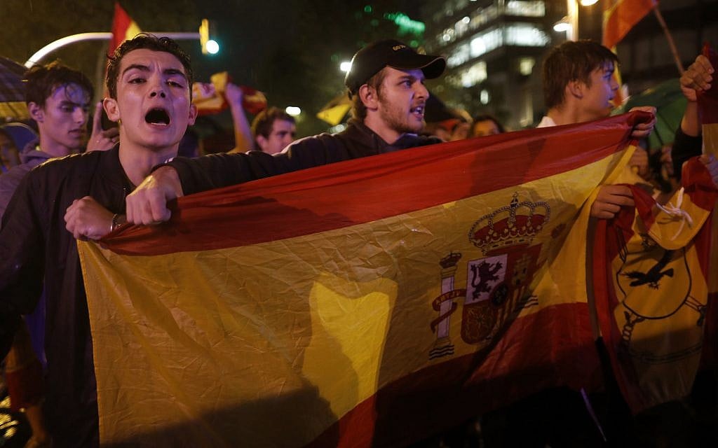 Demonstrators protest against the Catalan government's push for secession from the rest of Spain in Barcelona, Spain, Wednesday, Oct. 18, 2017. (AP Photo/Santi Palacios)