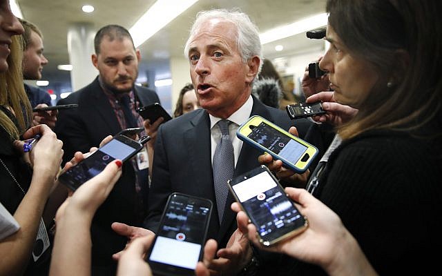 Sen. Bob Corker, R-Tennessee, speaks to reporters while heading to vote on budget amendments, Thursday, October 19, 2017, in Washington. (AP Photo/Jacquelyn Martin) Sen. Bob Corker, R-Tennessee, speaks to reporters while heading to vote on budget amendments, Thursday, October 19, 2017, in Washington. (AP Photo/Jacquelyn Martin)
