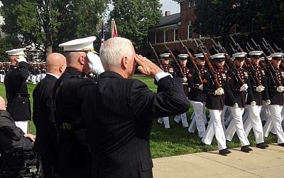 Vice President Mike Pence salutes during a ceremony honoring 241 U.S Service members killed 34 years ago in the 1983 bombing of the Marine Barracks in Beirut, Lebanon, October. 23, 2017 at the Marine Barracks in Washington. (AP/Ken Thomas)