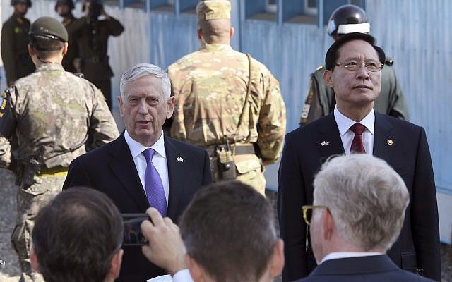 US Defense Secretary Jim Mattis, center, speaks to the media as South Korean Defense Minister Song Young-moo, right, looks on during a visit to the truce village of Panmunjom in the Demilitarized Zone (DMZ) on the border between North and South Korea Friday, Oct. 27, 2017 (Jung Yeon-je/Pool Photo via AP) US Defense Secretary Jim Mattis, center, speaks to the media as South Korean Defense Minister Song Young-moo, right, looks on during a visit to the truce village of Panmunjom in the Demilitarized Zone (DMZ) on the border between North and South Korea Friday, Oct. 27, 2017 (Jung Yeon-je/Pool Photo via AP)