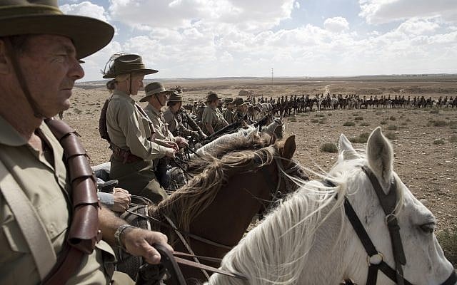 History enthusiasts and descendants of Australian Mounted Division and ANZAC (Australian and New Zealand Mounted Division) Mounted Division soldiers ride their horses during the reenactment of the Battle of Beersheba when British and ANZAC forces captured Beersheba from the Ottoman Empire during the World War I, as part of the 100 years anniversary in near Beersheba, southern Israel, Monday, Oct. 30, 2017. (AP Photo/Oded Balilty)