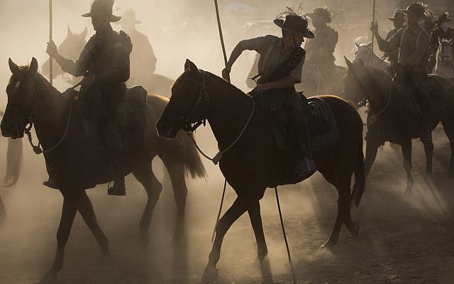 History enthusiasts and descendants of Australian Mounted Division and ANZAC (Australian and New Zealand Mounted Division) Mounted Division soldiers ride their horses during rehearsal of the reenactment of the Battle of Beersheba when British and ANZAC forces captured Beersheba from the Ottoman Empire during the World War I, as part of the 100 years anniversary in near Beersheba, southern Israel, Monday, Oct. 30, 2017. (AP Photo/Oded Balilty)