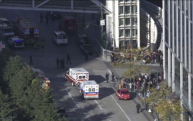 In this still image taken from video, police and ambulances respond to report of gunfire a few blocks from the World Trade Center in New York on Tuesday, Oct. 31, 2017. (AP Photo) In this still image taken from video, police and ambulances respond to report of gunfire a few blocks from the World Trade Center in New York on Tuesday, Oct. 31, 2017. (AP Photo)