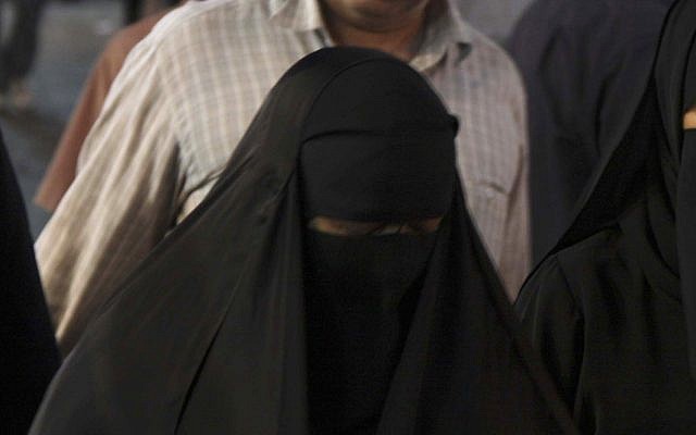 An illustrative photo of a woman wearing a niqab, a face-covering Islamic veil, in Damascus, Syria (AP Photo/Bassem Tellawi) An illustrative photo of a woman wearing a niqab, a face-covering Islamic veil, in Damascus, Syria (AP Photo/Bassem Tellawi)