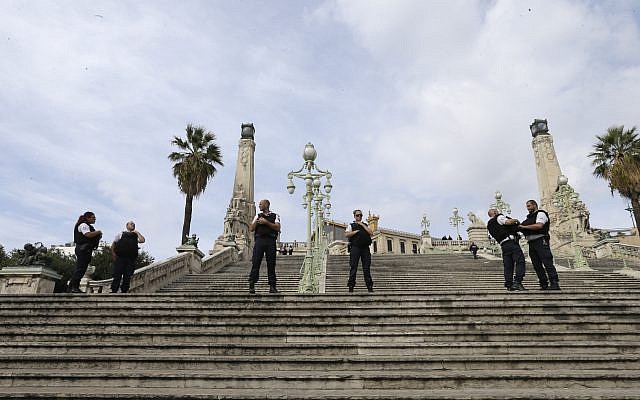 French police officers block access to Marseille's main train station, Sunday, Oct. 1, 2017. French police have warned people to avoid Marseille's main train station following a knife attack in which two people and the attacker were killed. (AP Photo/Claude Paris) French police officers block access to Marseille's main train station, Sunday, Oct. 1, 2017. French police have warned people to avoid Marseille's main train station following a knife attack in which two people and the attacker were killed. (AP Photo/Claude Paris)