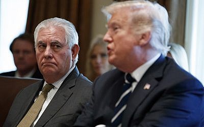 President Donald Trump speaks during a cabinet meeting at the White House, Monday, Oct. 16, 2017, in Washington, as Secretary of State Rex Tillerson listens. (AP Photo/Evan Vucci)