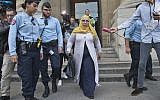 Zoulika Aziri the mother of the Merah brothers leaves the courthouse in Paris, France, Wednesday, October 18, 2017. (AP Photo/Michel Euler)
