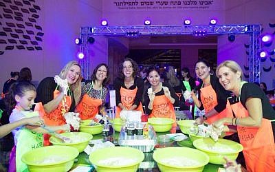 Women and girls participate in a challah bake in Costa Rica as part of the world-wide Shabbat Project 2017. (Courtesy: Shabbat Project via JTA)